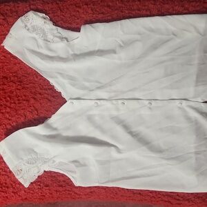 Sleeveless white shirt